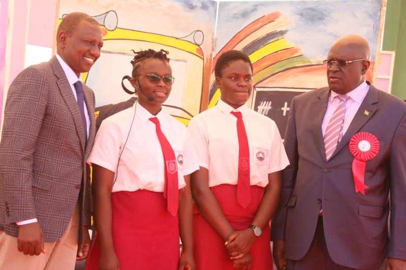 Deputy President William Ruto and the Cabinet Sec. Ministry of education Prof. George Magoha congratulate Lwak Girls Secondary School students during Kenya national drama festivals and Film festival state concert at Kibabii University in Bungoma county on April 12, 2019. [Benjamin Sakwa, Standard]  
