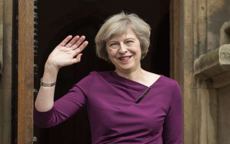 May quits as party leader, starts succession race