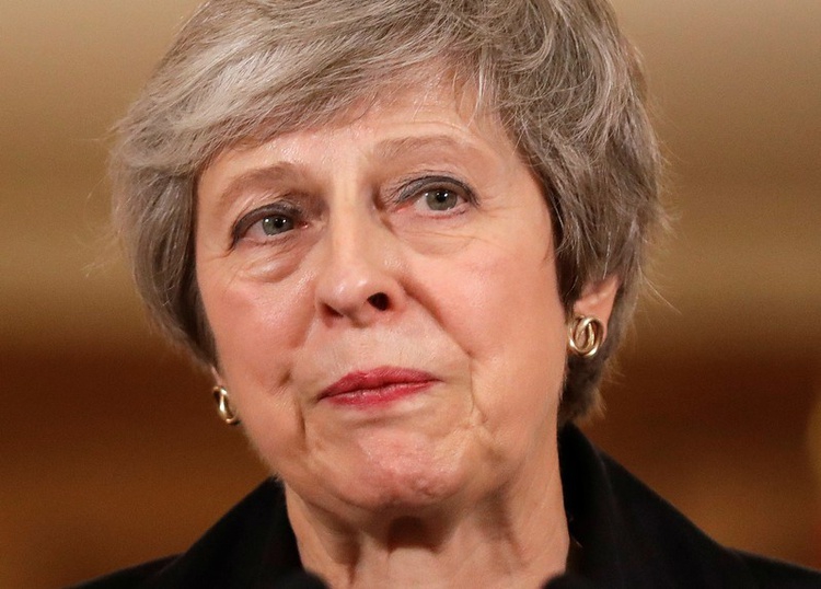 UK PM May fights for survival after Brexit deal triggers crisis