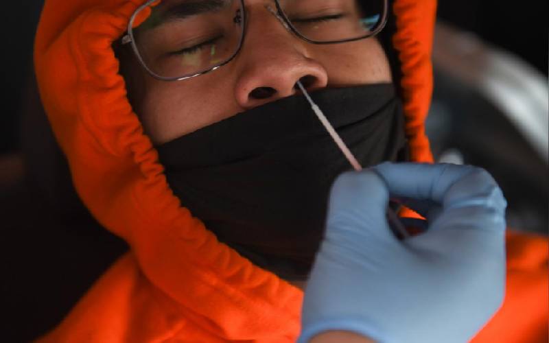 US sets one-day record for Covid-19 cases, Texas pauses reopening