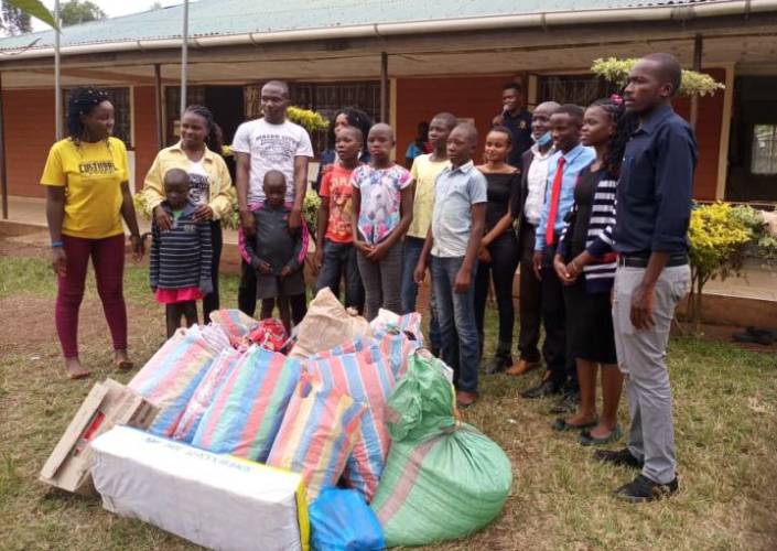 Comrades share joy and chapos with orphaned children