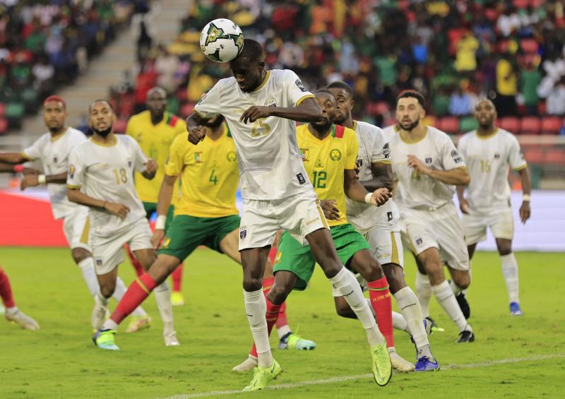 Hosts Cameroon top Cup of Nations group despite being held