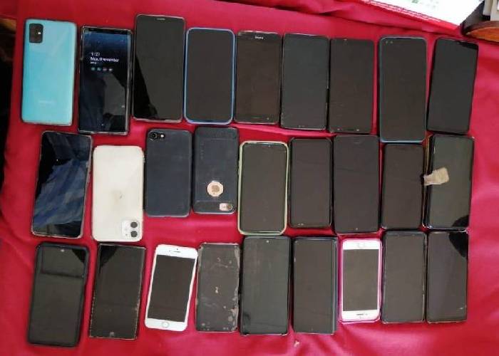 Police recover over 50 stolen phones, arrest three suspects