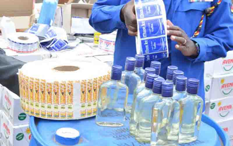 Six employees seized as police raid counterfeit liquor distillery