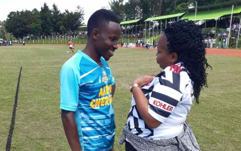 Soccer fans relish photo opportunity with Millicent Omanga