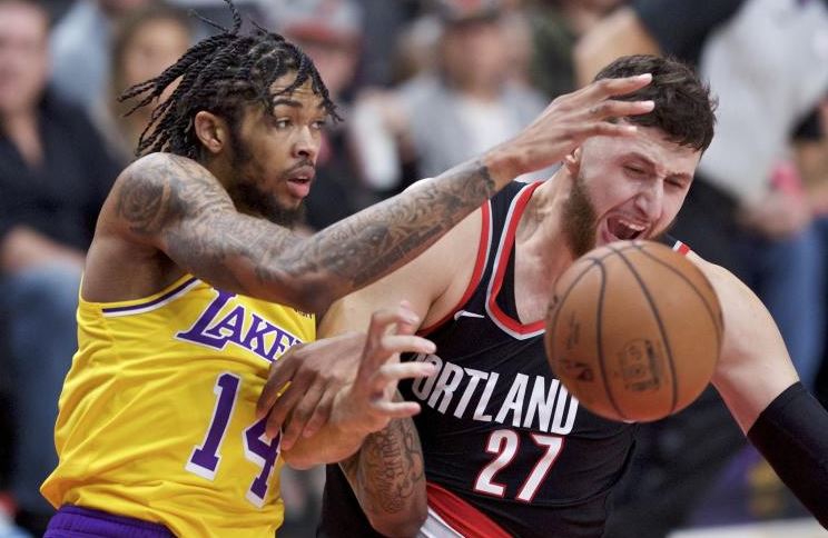 Lakers snap Portland losing skid, Oladipo powers Pacers