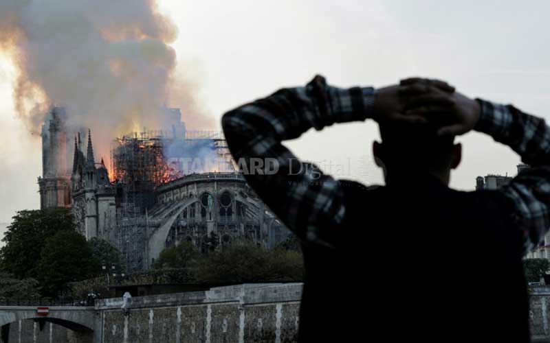 'Paris is disfigured': Tears and shock as Notre-Dame burns