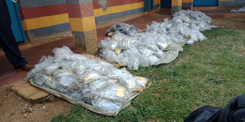 Police officers arrested ferrying illicit alcohol in government vehicle