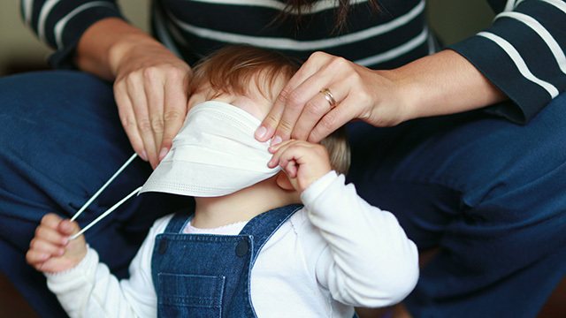 Masks in the playground: Pandemic babies in for a rude culture shock