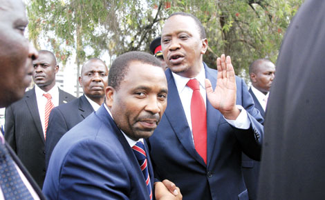 President Uhuru Kenyatta and Mwingi Central MP Joe Mutambu  after State of the Nation address at Parliament on Thursday . [PHOTO: GOVEDI ASUSTA/ STANDARD]