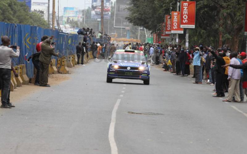 As rally cars cruised along Uhuru Highway,