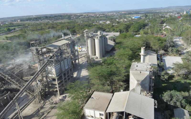 Cement maker cuts loss on lower costs
