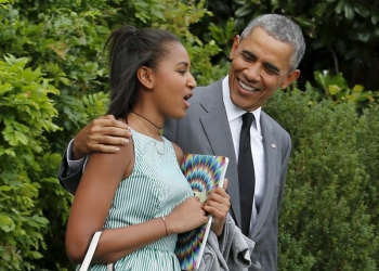 'Dad-in-chief' Obama takes daughters for night out