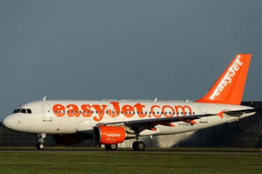 Drunken lout accused of smoking on Easyjet flight launches homophobic rant at stewardess 