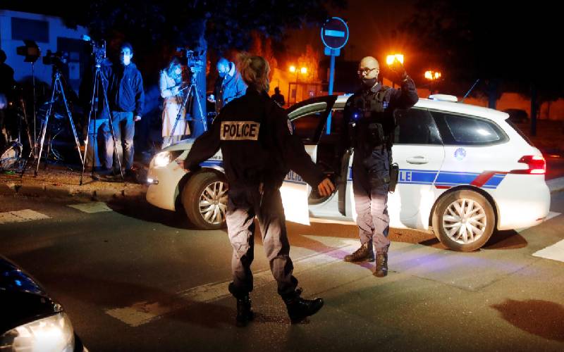 French police arrest nine after teacher beheaded in street