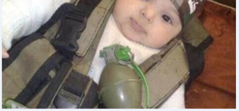 Islamic State dress baby as suicide bomber with live grenade
