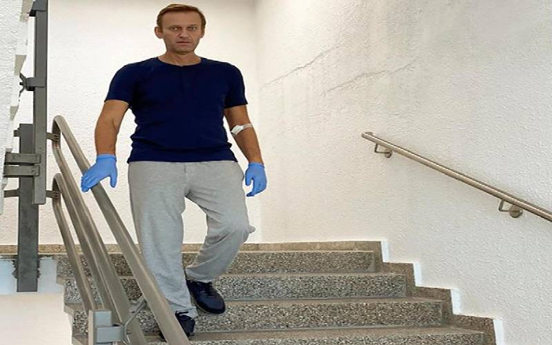 Kremlin critic Navalny posts photo of himself walking