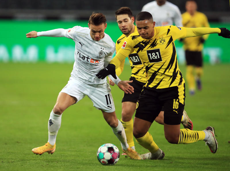 Moenchengladbach 4-2  Dortmund: Gladbach break Borussia Dortmund jinx to go fourth in Bundesliga