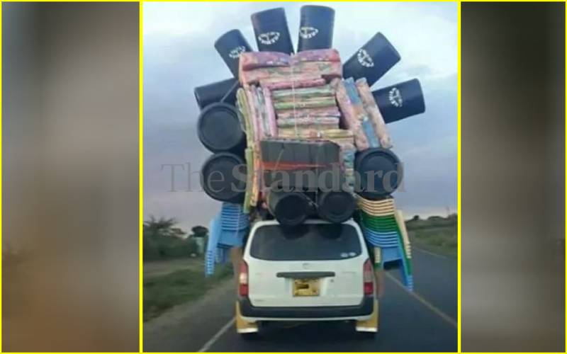 Probox ferrying household items.