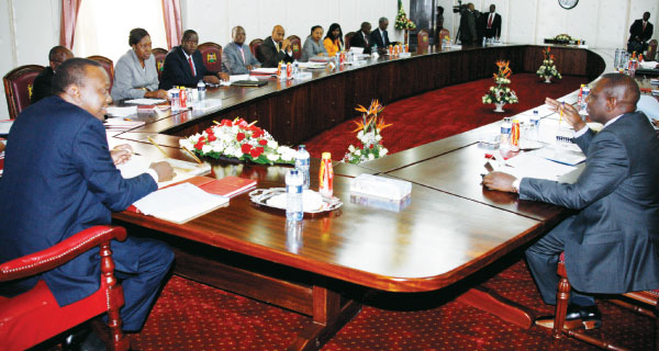 President Uhuru Kenyatta and his deputy William Ruto hold a Cabinet meeting.  INSET: Presidential Advisor  Abdikadir  Mohammed [PHOTOS:  FILE/STANDARD]