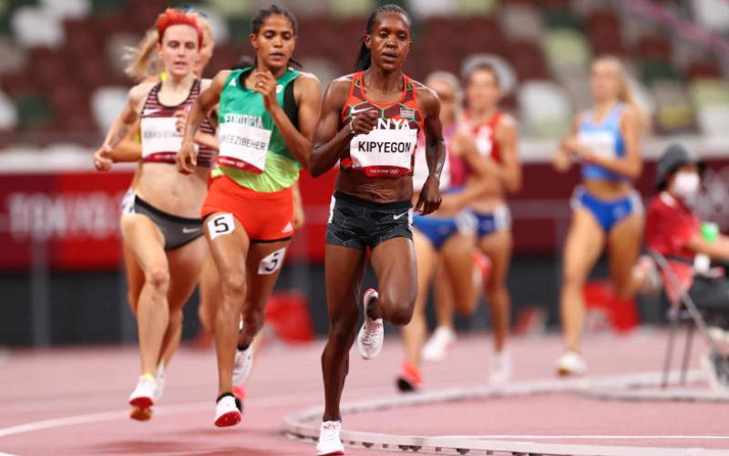 becoming only the third athlete in history to...