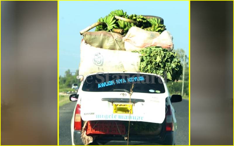 Probox hauling kales in Katito, Kendu Bay.