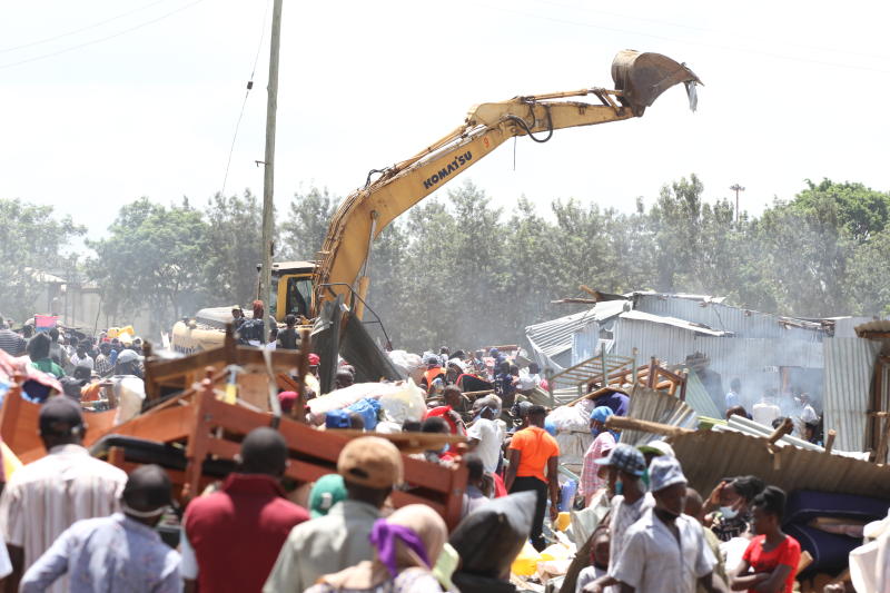 What kind of political naivety led to Kariobangi demolitions?