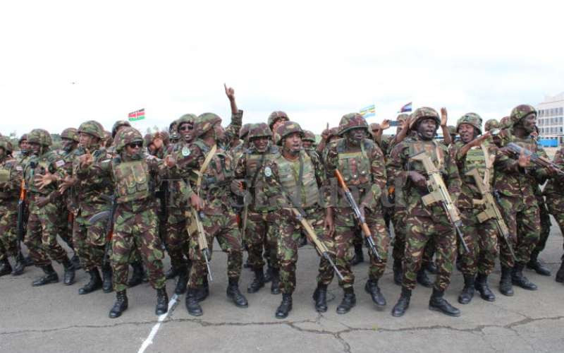 KDF troops chant after being flagged off.