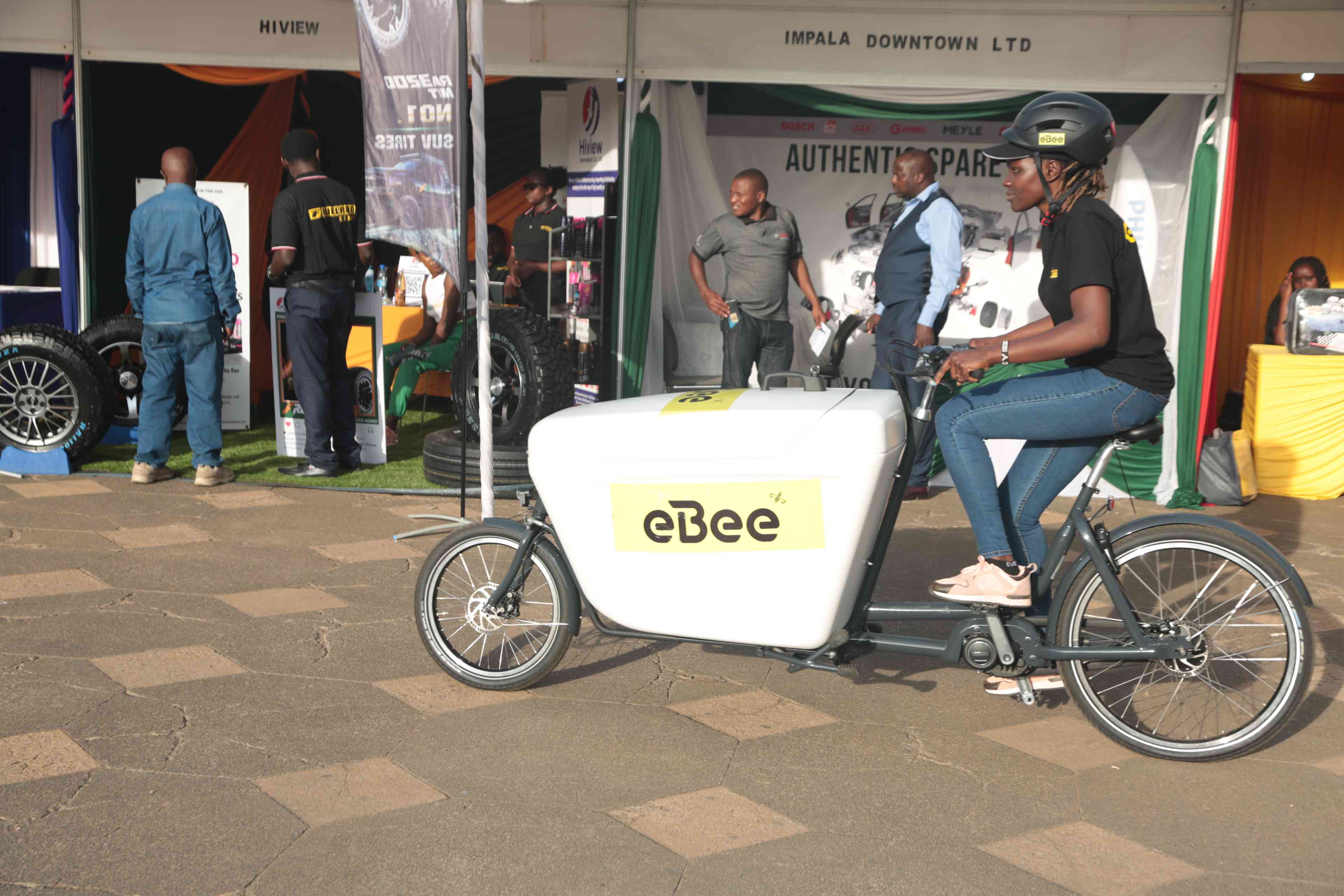 A motor show visitor testing out the ebee e-bikes