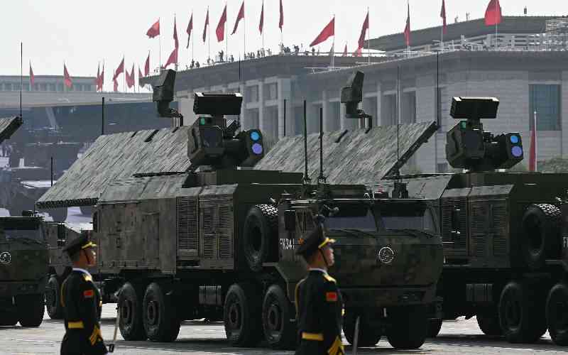Beijing shows off drones, missiles and lasers in military parade