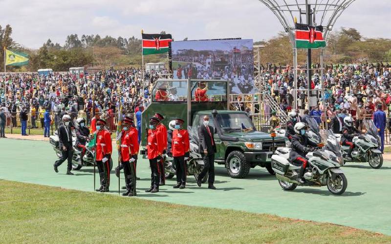 Uhuru waving to Jamhuri Day attendees.