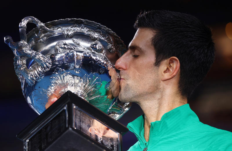 Djokovic wins eighth Australian Open crown, reclaims world number one ranking