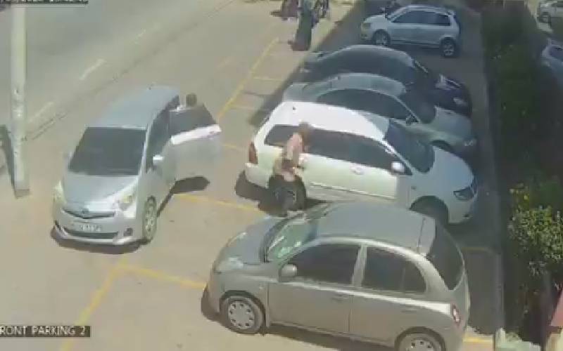 Suspect caught on CCTV breaking into cars arrested