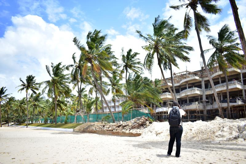Beach properties face demolition