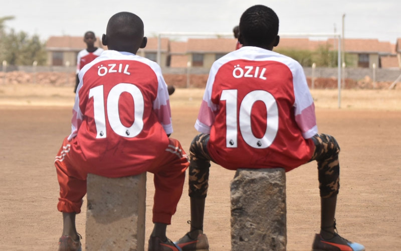 Touch of class: Arsenal star Mesut Ozil rewards Kenyan boy for second time