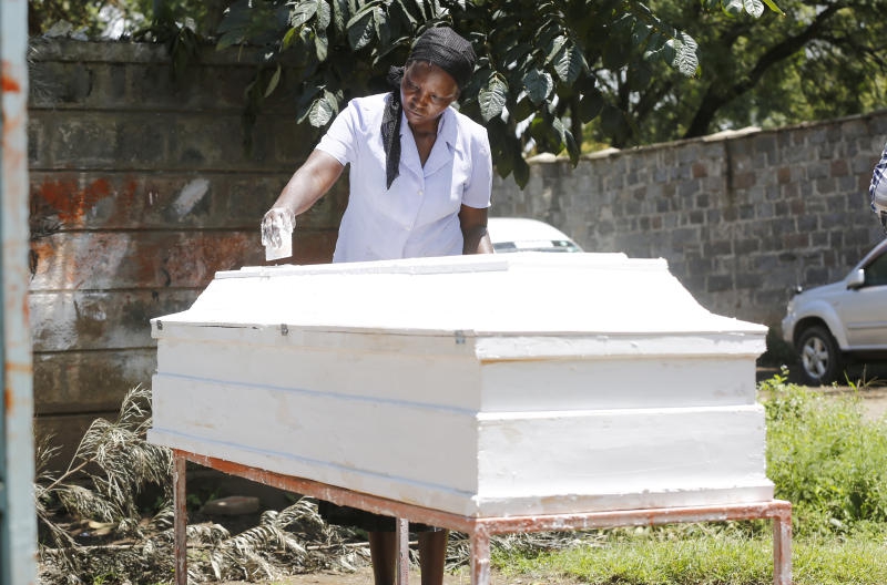 Woman coffin maker who mourns with her clients