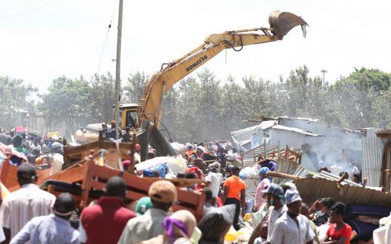 What kind of political naivety led to Kariobangi slums demolitions?
