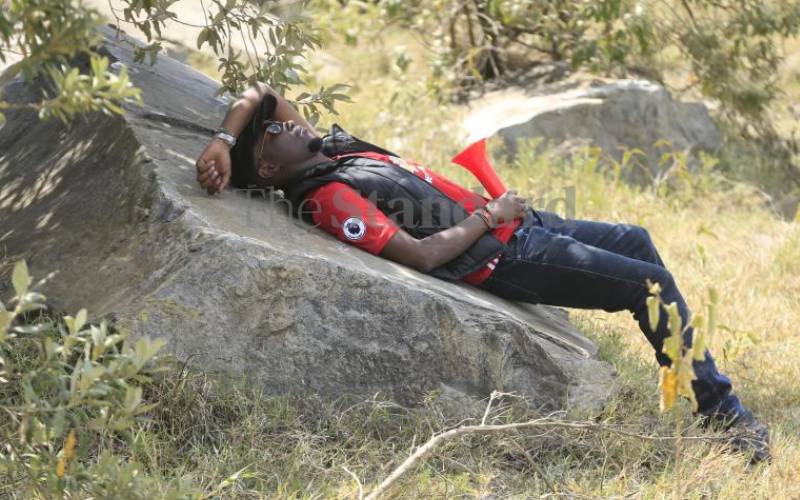 A spectator takes rest at Hell's Gate, Naivasha