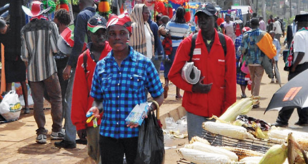 Vendors doing  business during the Jubilee celebrations at Safaricom Stadium, Kasarani. [PHOTO: LILLIAN KIARIE/