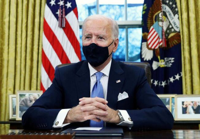 Biden launches COVID-19 initiatives on first full day in White House