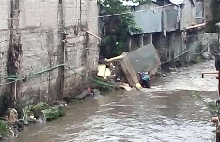 the heavy downpour damaged houses and...