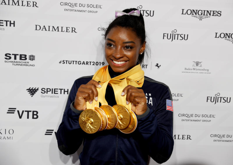 Gymnast Biles cried at news of Tokyo postponement