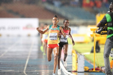 Kenya’s Chepkirui pushes Ethiopian Abersh Minsewo to the line as she settles for silver in girls’ 3,000m