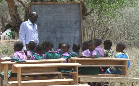 Where pupils study under trees and watch out for deadly scorpions
