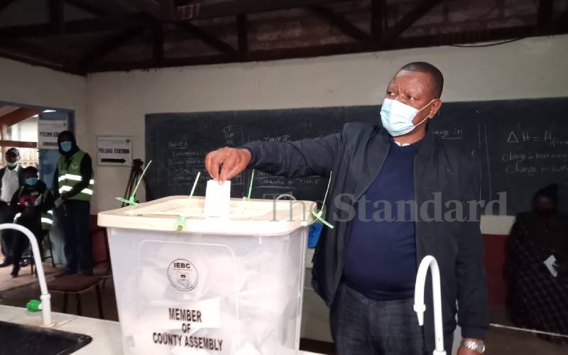 Jubilee's Joseph Githinji votes at Kahuho High