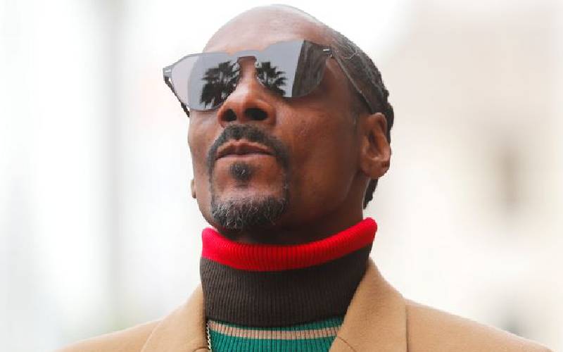 Rapper Snoop Dogg acquires debut label Death Row Records