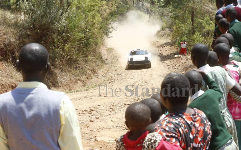 Pupils catching the rally action at Sacho. 