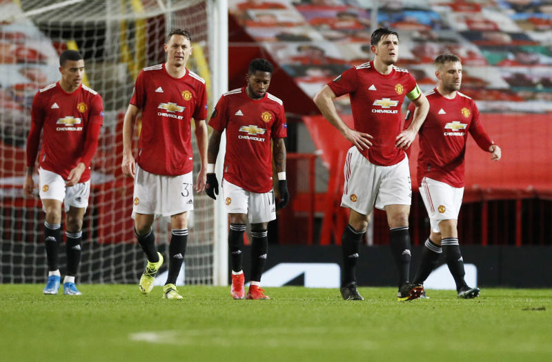 Stoppage-time header earns AC Milan draw at Man United