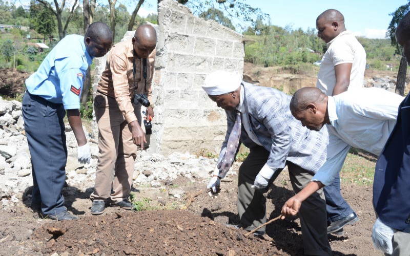 Cleric arrested after exhuming seven bodies