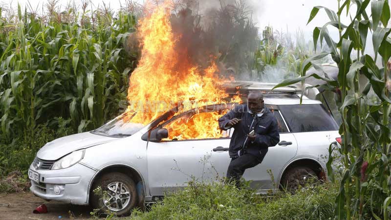 Photos: Irate residents burn car transporting meat